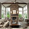 modern-living-room-design-ideas-with-fireplace-wooden-flooring-ceiling-fan-cream-sofa-design-wood-table-brown-armchair-table-lamp-glass-window-interior-living-room-furniture-sets