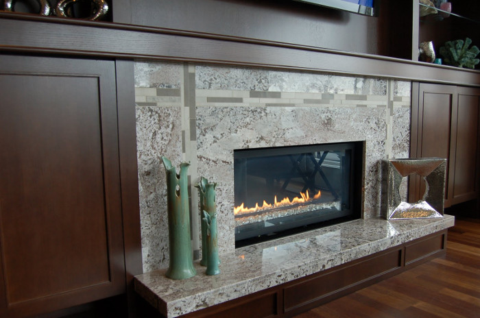 облицовка камина гранитом